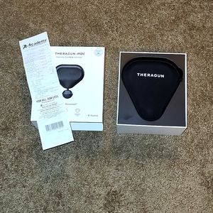 New in box Theragun mini